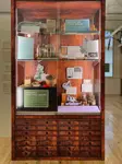 "Display case in Aurora room, showing historical artifacts"