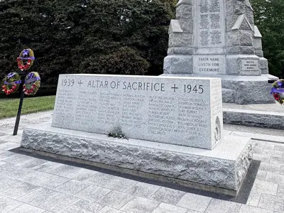 Altar of Sacrifice (1960 – WWII) stone sitting on grey tiles